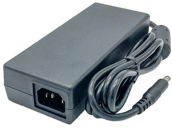 A black power supply with an attached cable and plug, suitable for electronic devices.