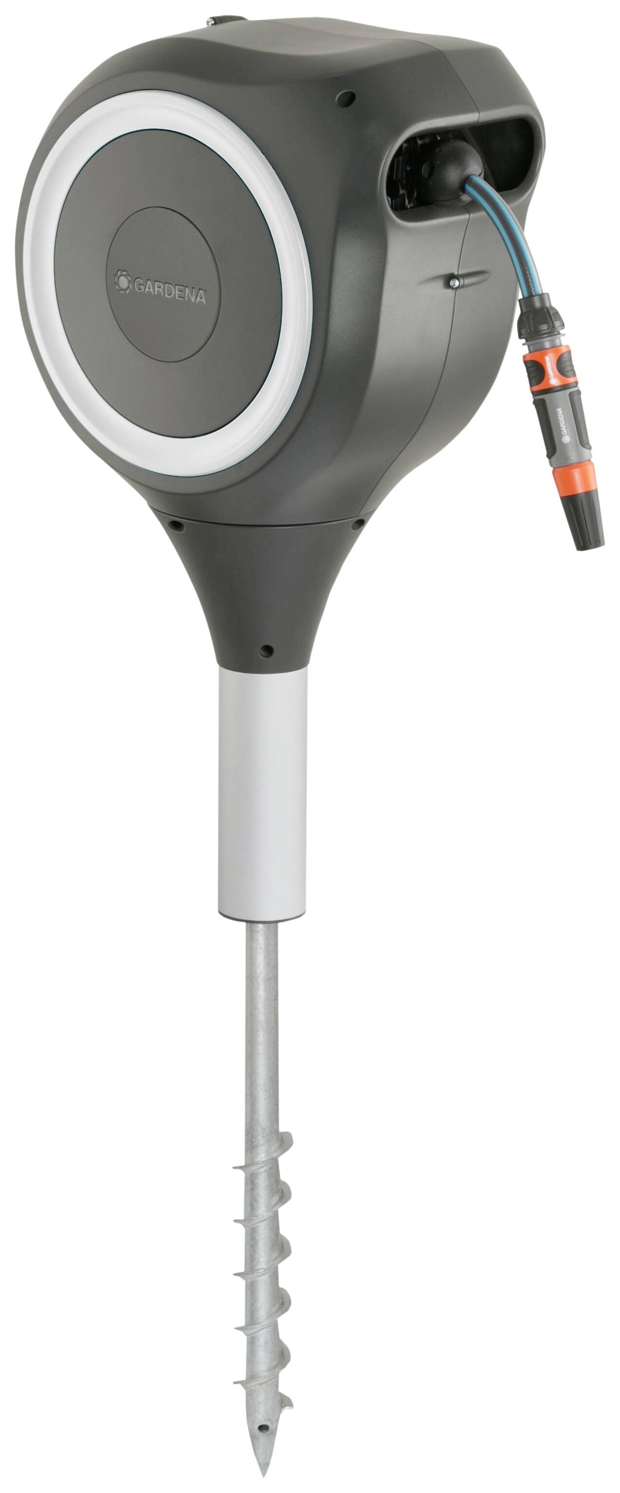 A black, drop-shaped device with a spiral base, with a cable connection at the top. Used for garden irrigation.