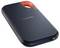 External SanDisk hard drive with rounded corners, black perforated surface, and orange accent in the upper section.
