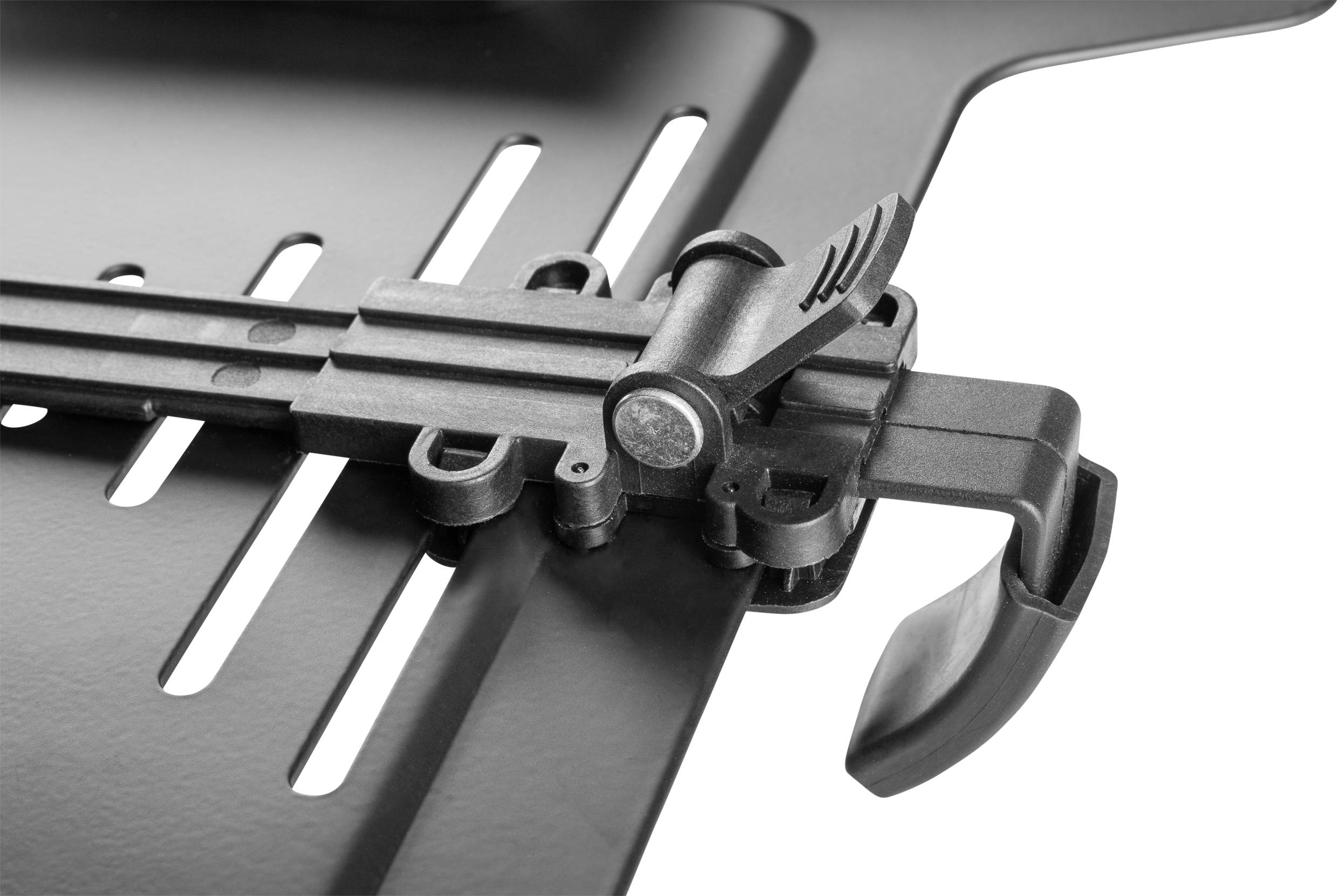 An adjustable holder on a black metal frame, likely part of a barbecue or kitchen accessory, ensures stability and adaptability.