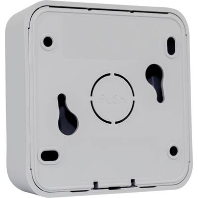 A square grey plastic casing with rounded corners, two keyhole apertures for wall mounting and the inscription 'PUSH' in the centre.
