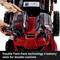 Red lawn mower with 'Double Twin-Pack Technology': 4 battery slots for double runtime. Hands inserting battery.