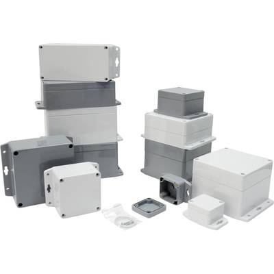 Several different sized and shaped grey and white plastic casings, stacked and placed side by side on a white background.