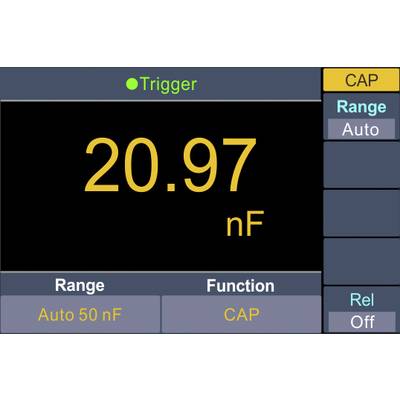 Digital measuring device shows: Capacitance measurement at 20.97 nF in automotive range mode. Functions: Trigger activated, Relative mode off.