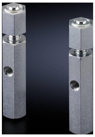 Two silver, hexagonal metal parts with threads and holes on a grey surface, likely used as connecting components.