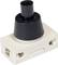 A black button on a white, rectangular housing; electrical door contact switch, commonly used in fridges.