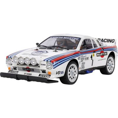 Toy car in rally style, Lancia vehicle with 'Martini' sponsorship, rally stripes, and headlights. Racing design elements.