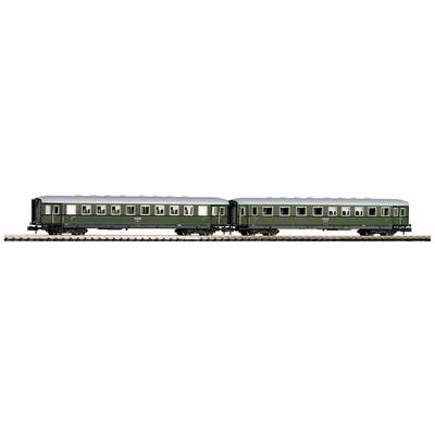 Two green, stylised model train passenger carriages on tracks, standing side by side, with detailed windows and doors.