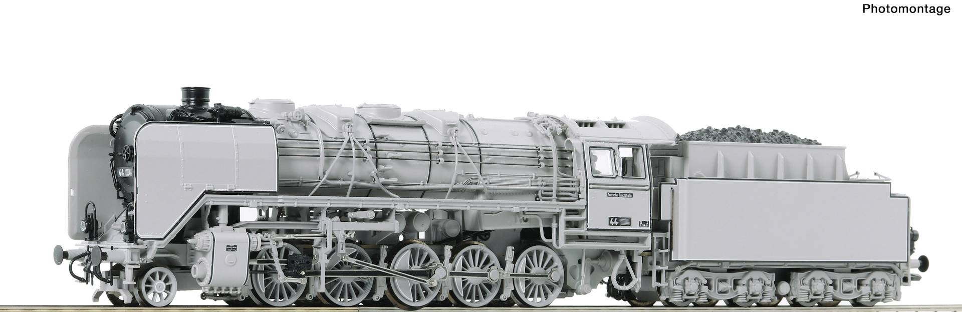 A model of an old steam locomotive with detailed chassis and chimney, black boiler, grey coal-filled tender.
