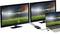 Two monitors and a laptop display a stadium at sunset, all connected via a USB-C adapter emanating from the laptop.