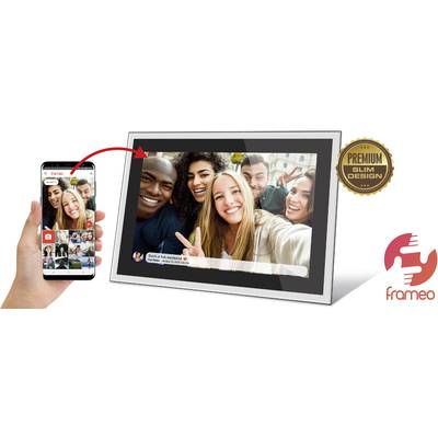 A hand is holding a smartphone with the Frameo app. To the right, a digital photo frame displays a group selfie.
