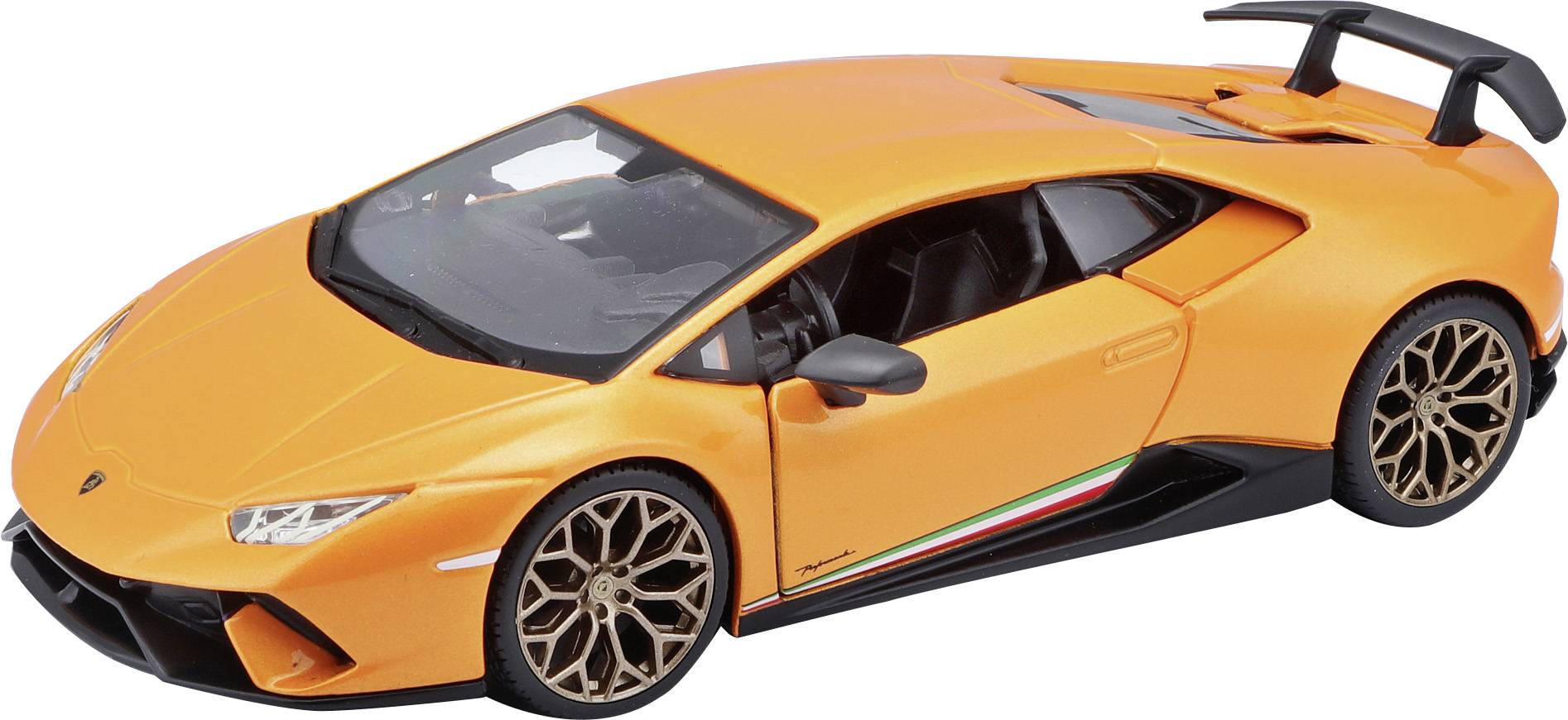 An orange model car with a sporty design and large rear spoiler, pictured on a neutral surface.
