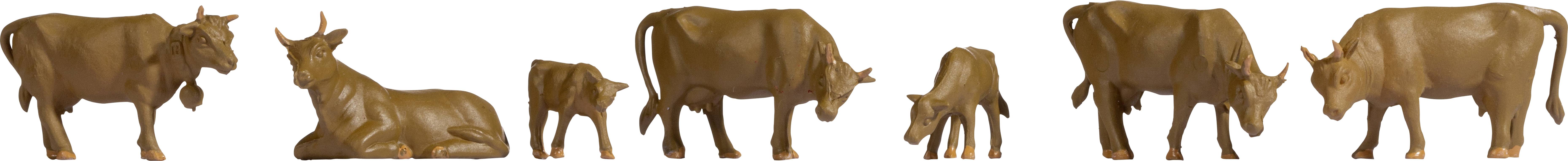 Six chocolate cows in various positions and sizes, all crafted from brown chocolate, against a white background.