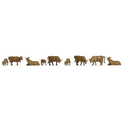 A row of six wooden cows standing or lying in different positions.