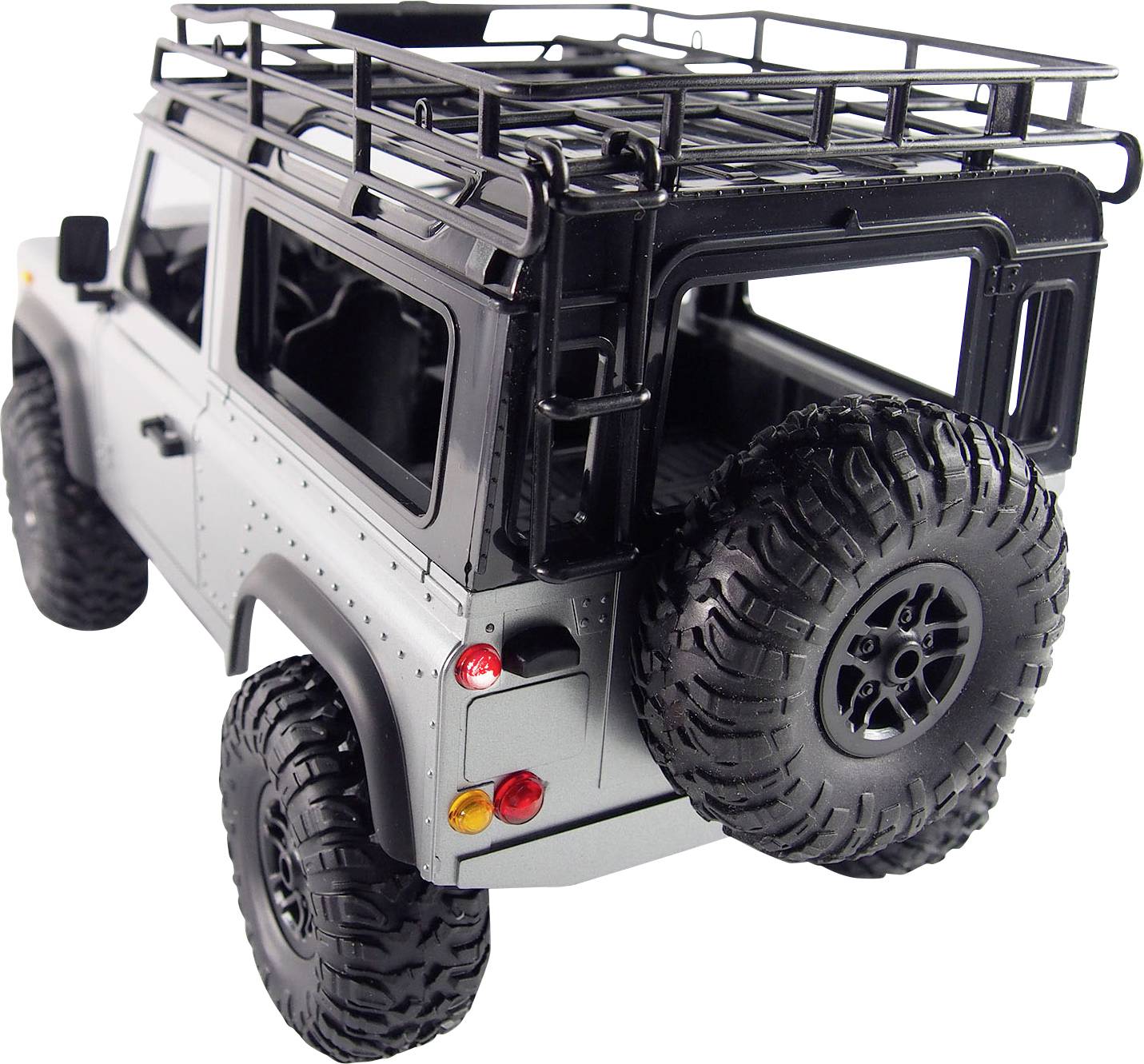 A grey model SUV with a rear spare wheel mount and roof rack. The design showcases robust outdoor elements.