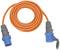 Orange extension leads with blue plugs. Suitable for outdoor use, such as on campsites or construction sites.
