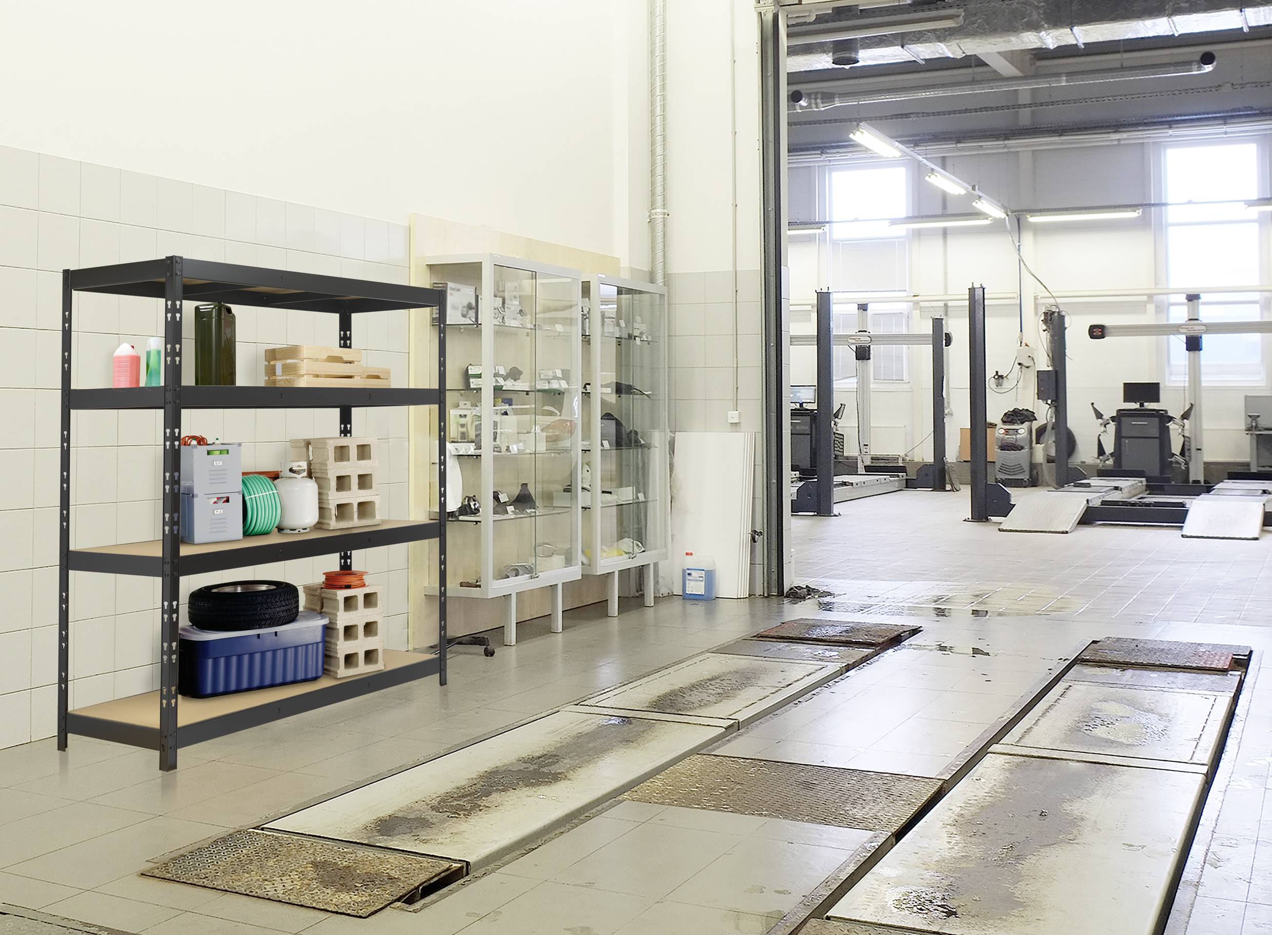 In a car workshop, shelves are stacked with car parts and accessories. Car lift platforms are located in the workshop hall. Light streams through large windows.