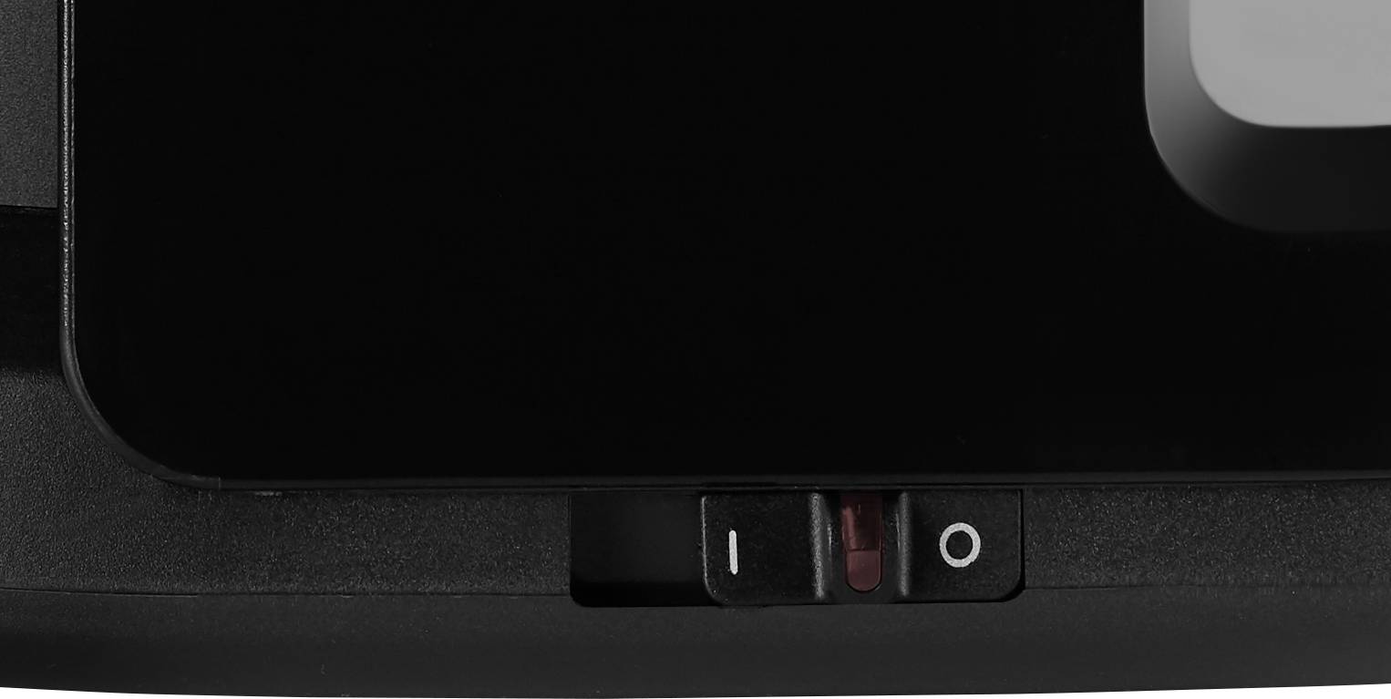 Black toggle switch on a device, with positions 'I' for on and 'O' for off, indicates the current state of the device.