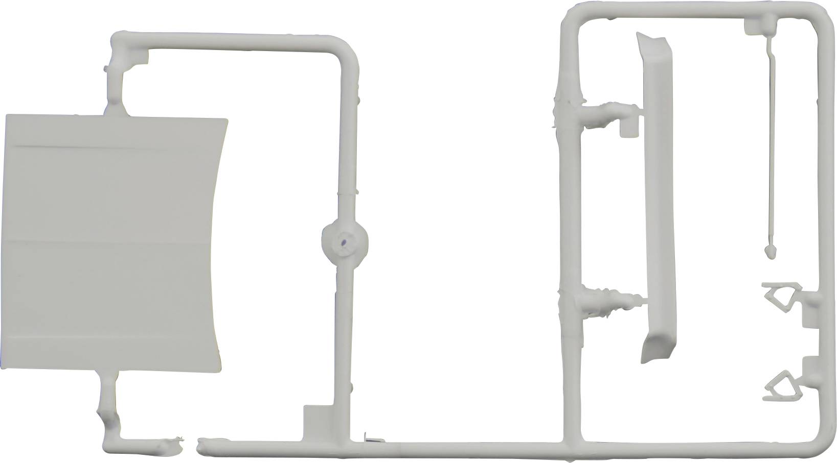 Plastic model building components in a frame, including a door and various smaller parts.