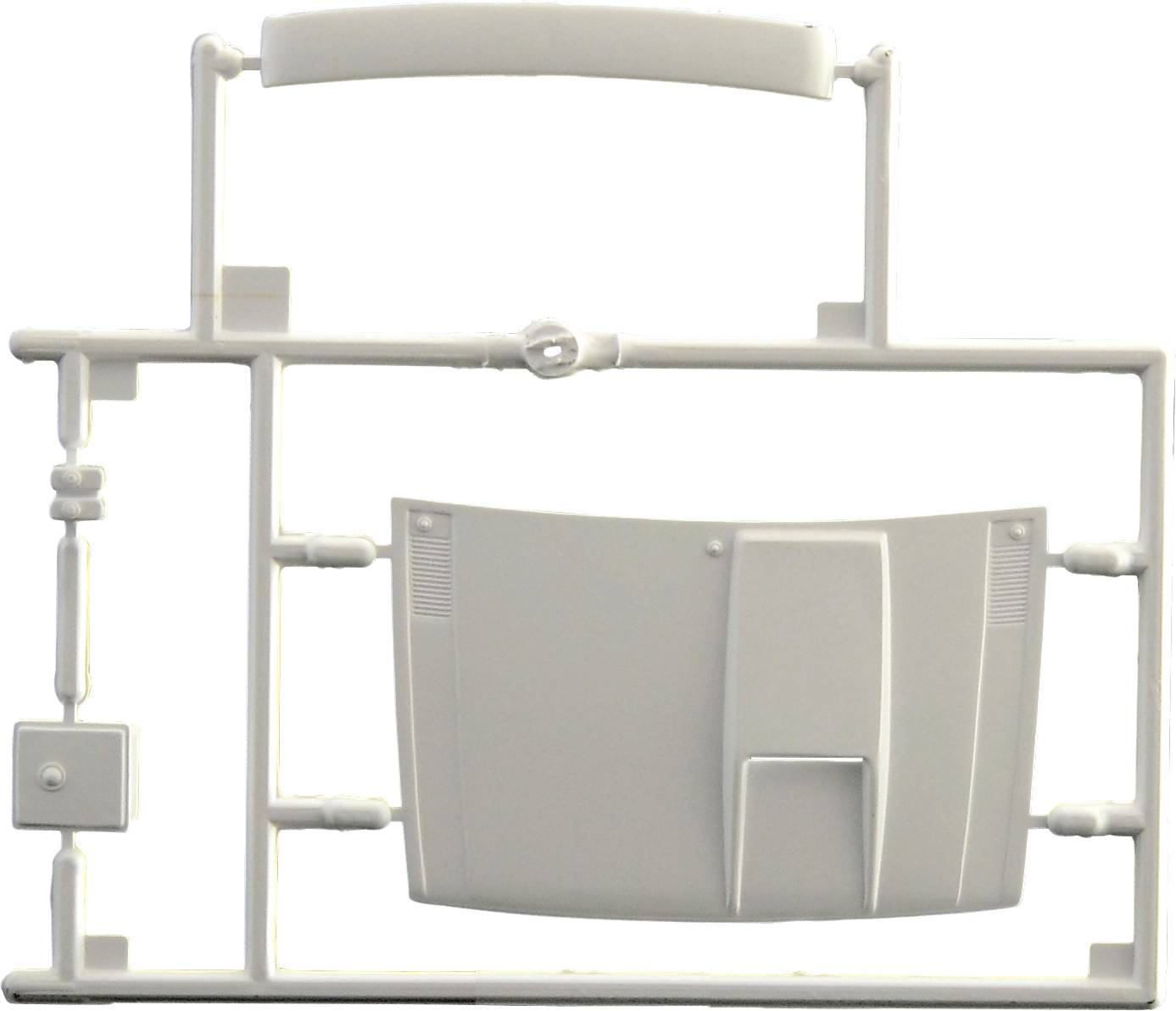 A grey plastic model kit frame with various small components, including a rounded plate-like form in the centre.