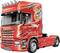 Red lorry with dynamic eagle design on the side, brand name 'Scania' visible. The lorry is standing on a white background.