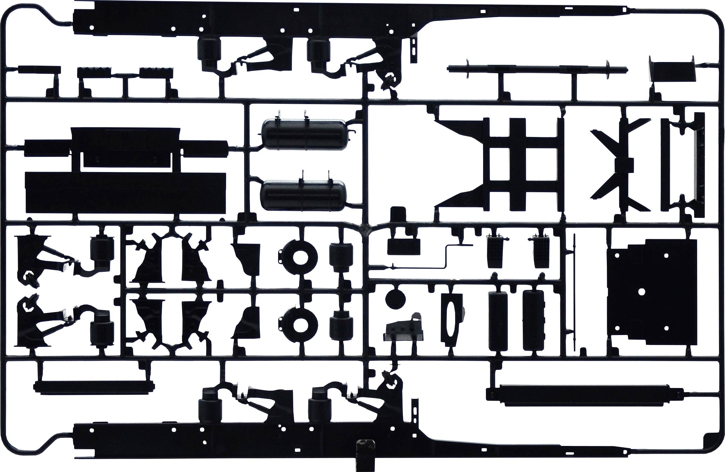 Parts of a model kit, arranged in a rectangular frame, ready for assembly.