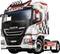 A white Iveco lorry with red and black accents and the 'Abarth' logo. The lorry has a sporty design and is standing against a white background.