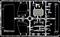 Transparent plastic model kit with various car parts, including windows and spoiler. Parts are arranged in a grid.