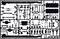 Plastic frame with various model vehicle components, including axles, wheels, and chassis parts.