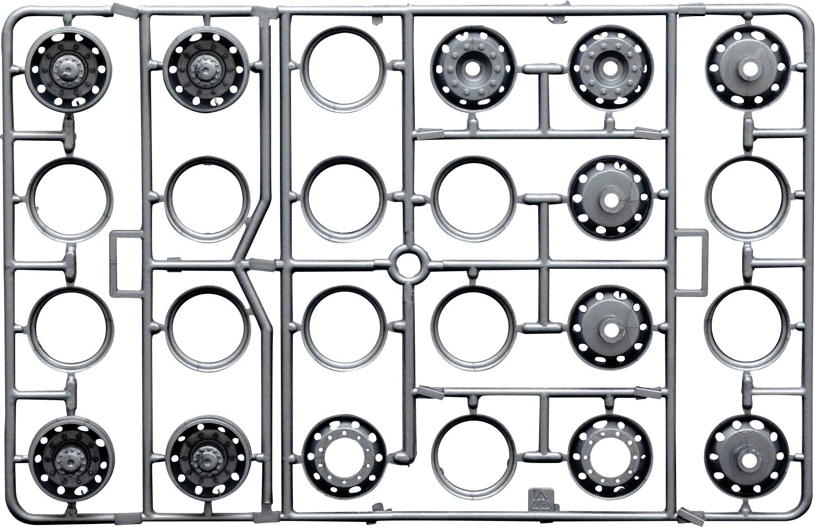 Plastic frame with round components prepared for model building. The structure resembles a casting frame for model kits.