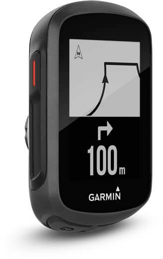 A GPS navigation device displays a turning instruction on the screen with an arrow and a distance indication of 100 metres.