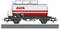 Model train tanker car with silver and red AVIA logo on the side, detailed railing and ladder, positioned on railway tracks.