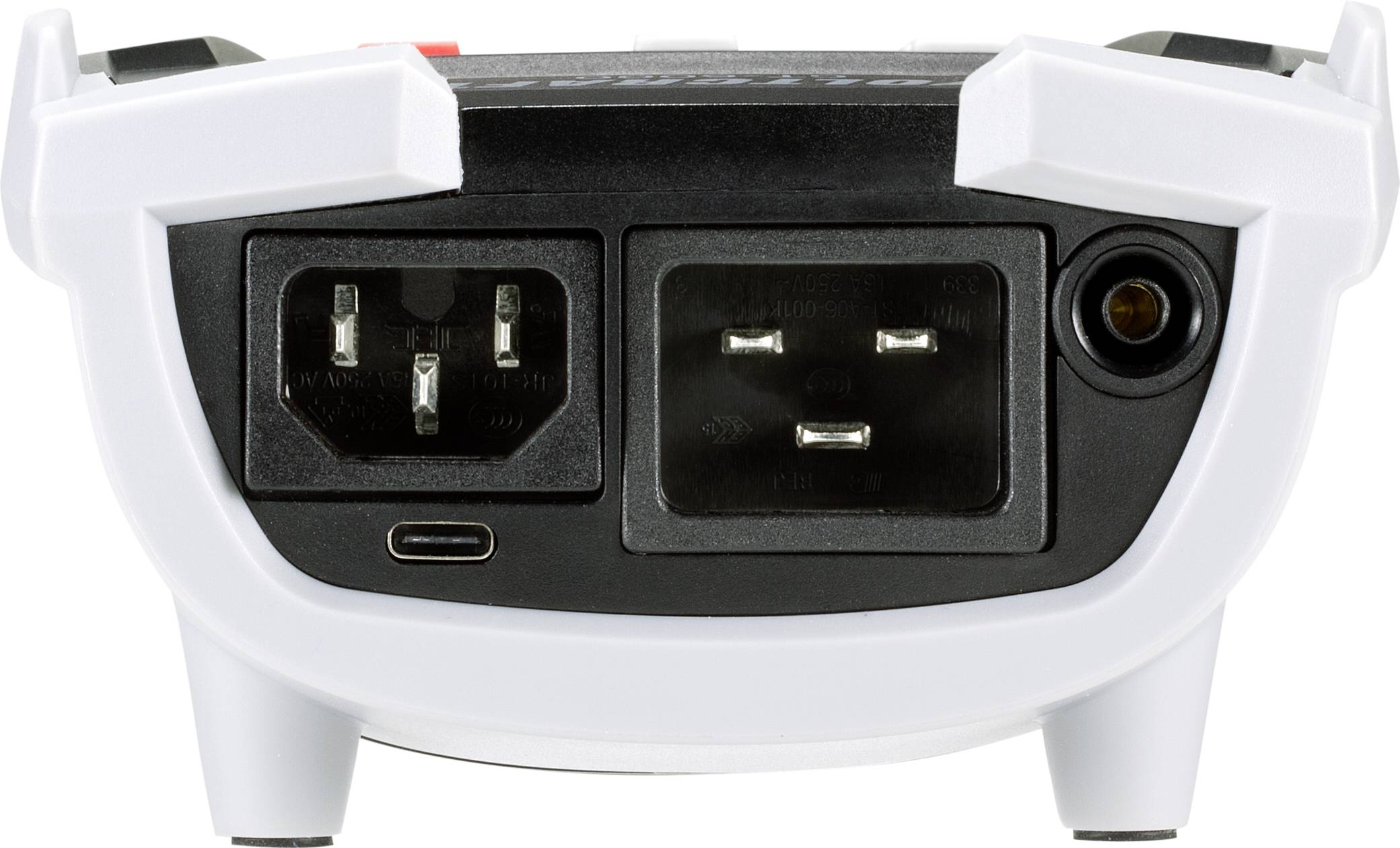 Back of an electronic device with a power socket, USB port, and circular connector, mounted on white plastic feet.