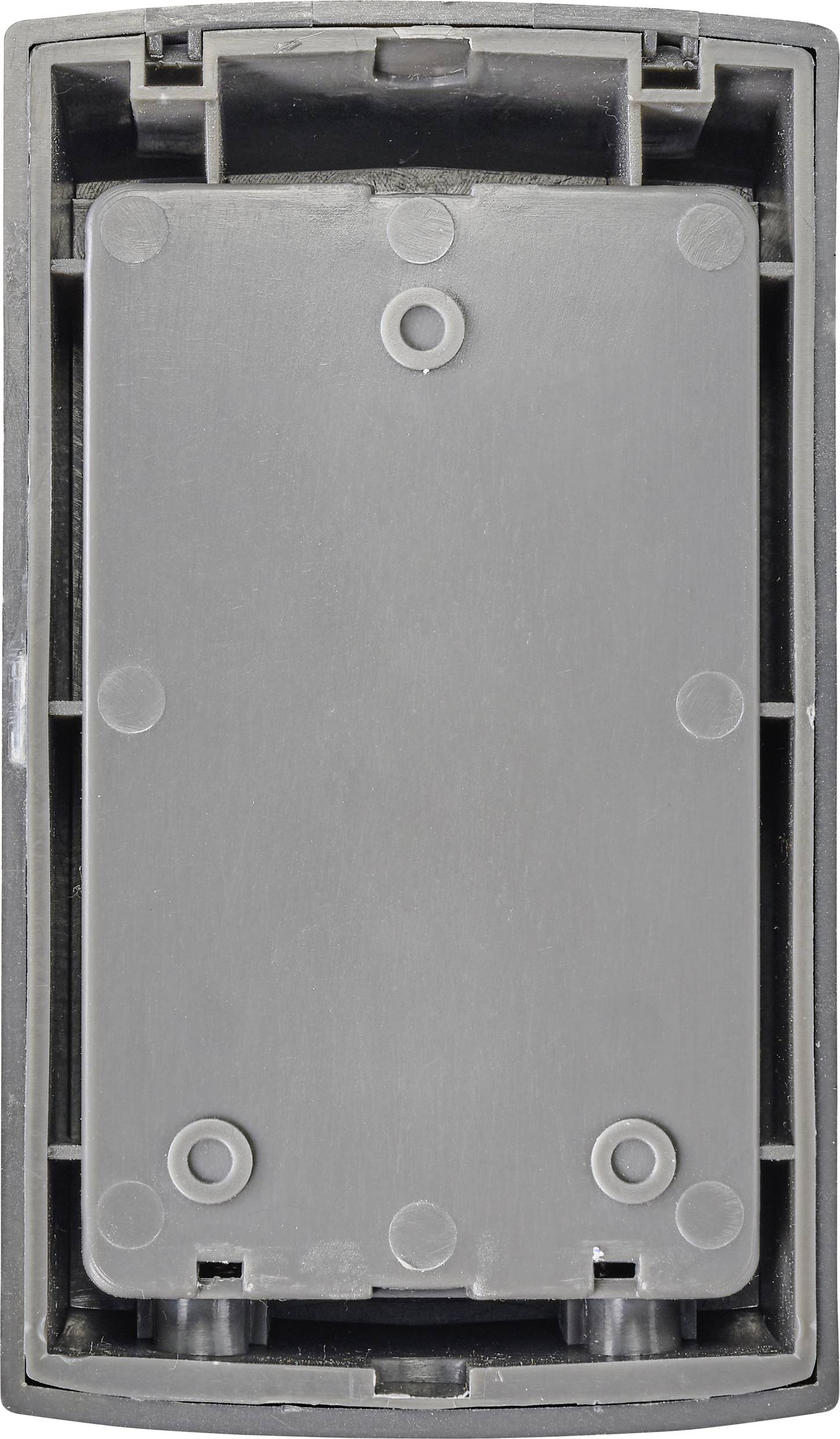 Grey, rectangular plastic casing with no visible logos or markings, potentially the rear side of an electronic device.