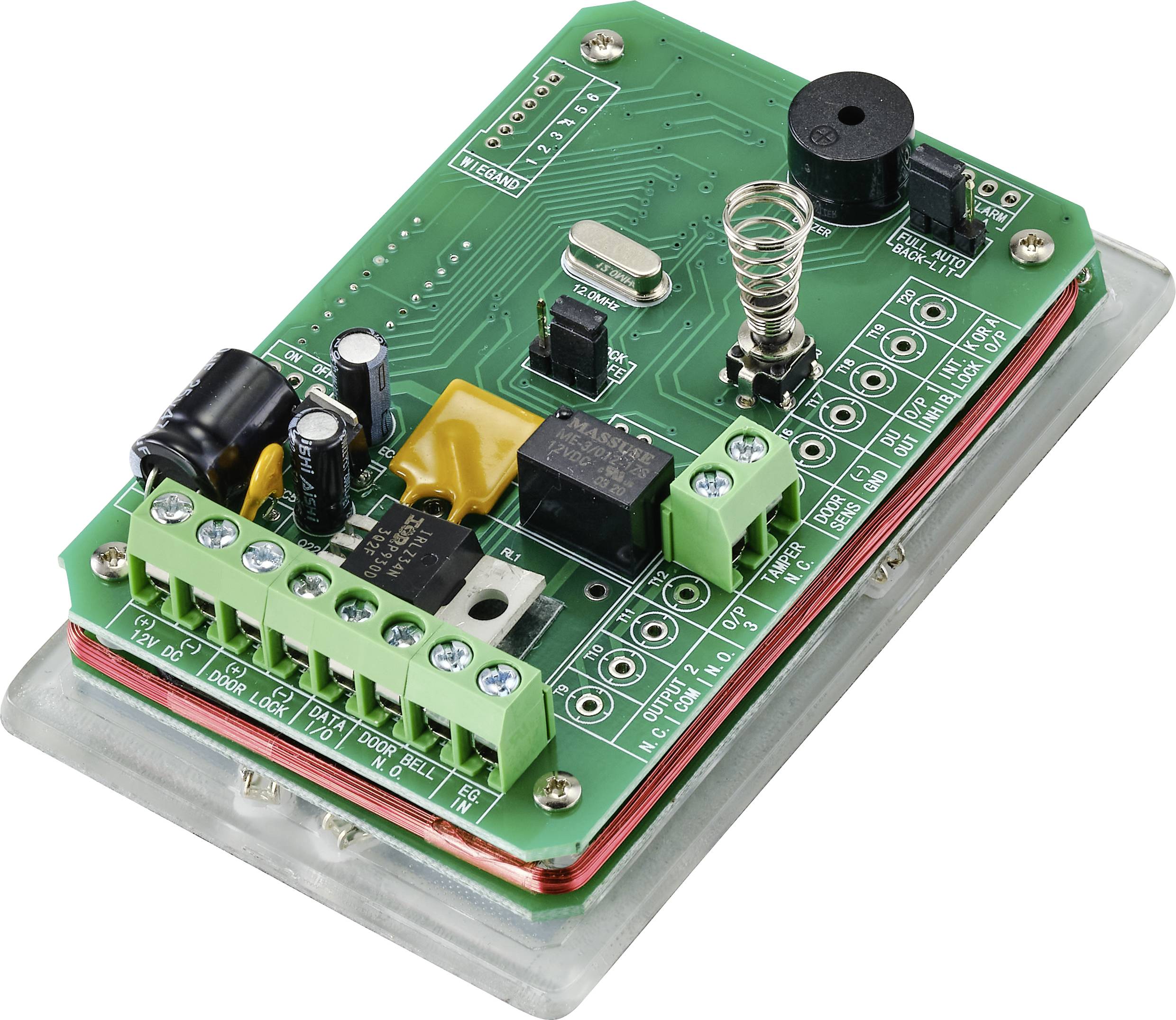 A green printed circuit board with various electronic components such as capacitors, inductors, and multiple terminal blocks.
