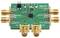 A green electronic circuit board with golden connectors and various components, including a black chip in the centre.