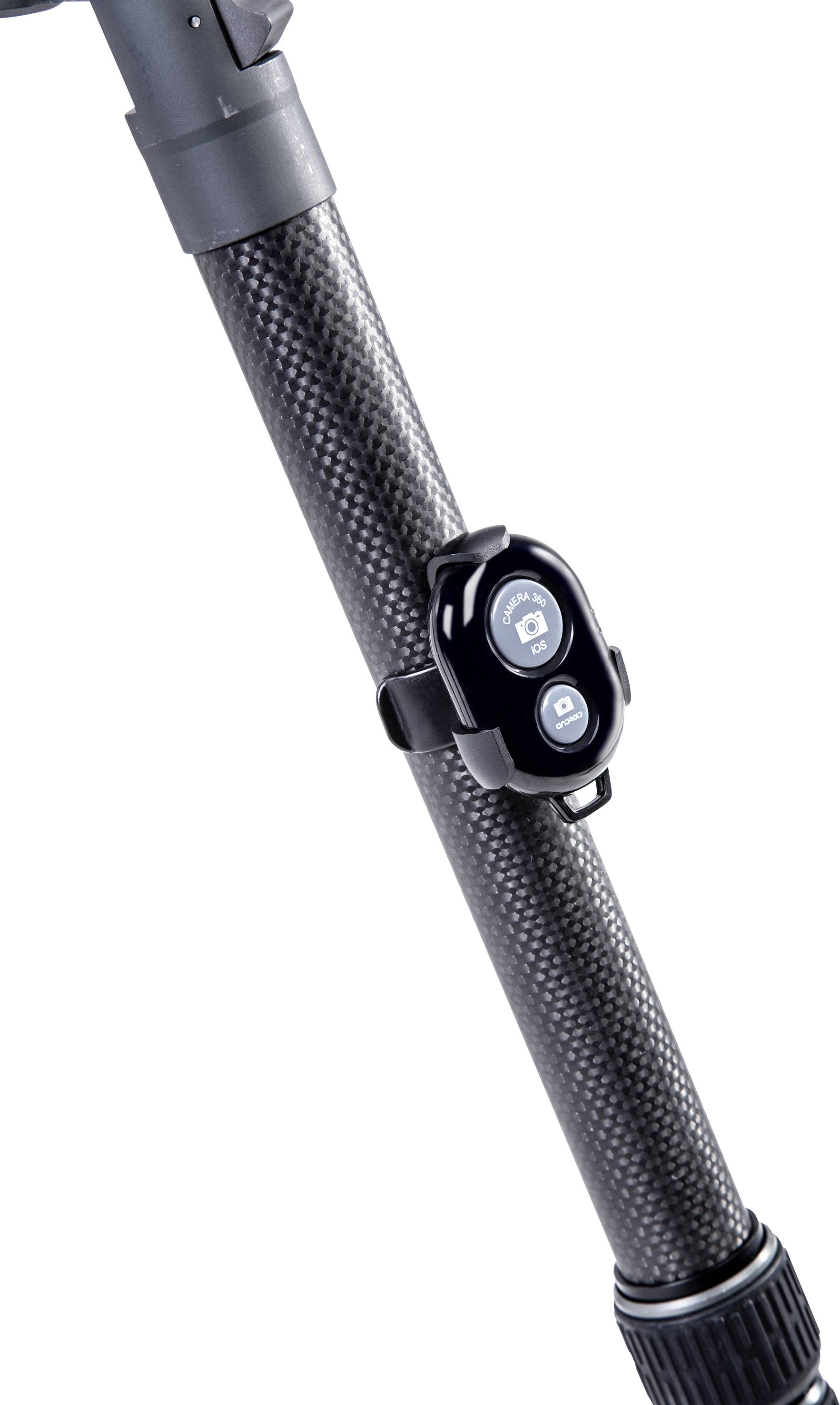 Close-up of a carbon telescopic pole with a small, oval, black and white control device mounted, featuring two buttons.