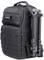 Black camera backpack with multiple compartments and side attachment where a folded tripod is secured.