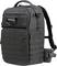 A black, rectangular rucksack with multiple zip compartments and padding, suitable for camera equipment.