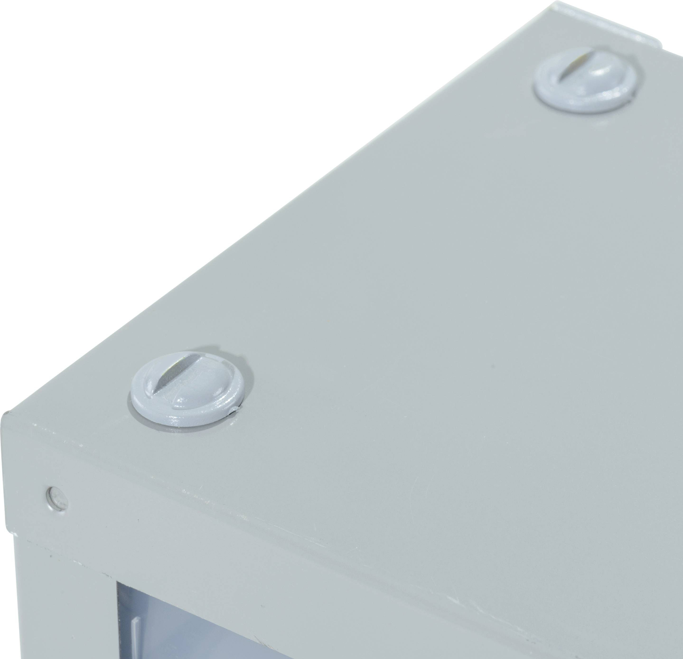 A grey, square metal box with visible screw heads at the corners and an open area on one side.