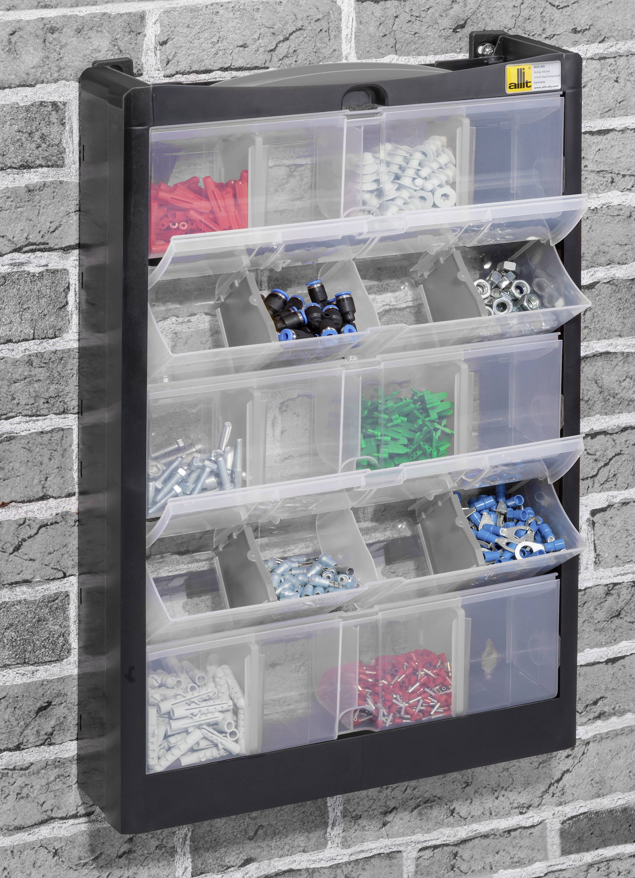 Wall shelf with clear shelves, filled with various screws and small parts, mounted on a grey brick wall.