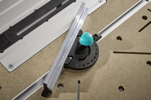 Angle-adjustable stop on a workbench, mounted on a circular guide element for precise angle adjustment.