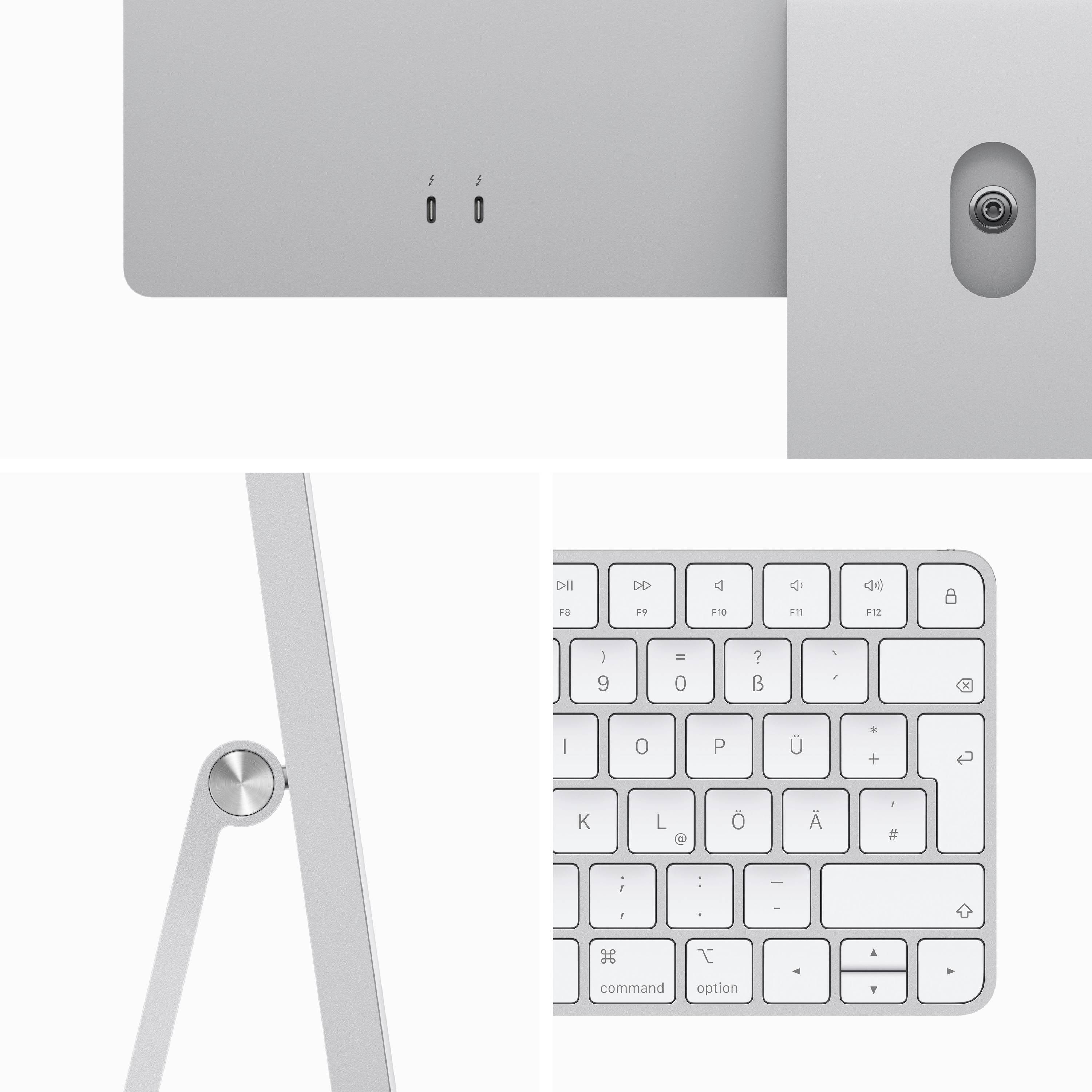 A computer monitor and a keyboard are displayed. The monitor sits on a metal stand, and the keyboard has special characters.