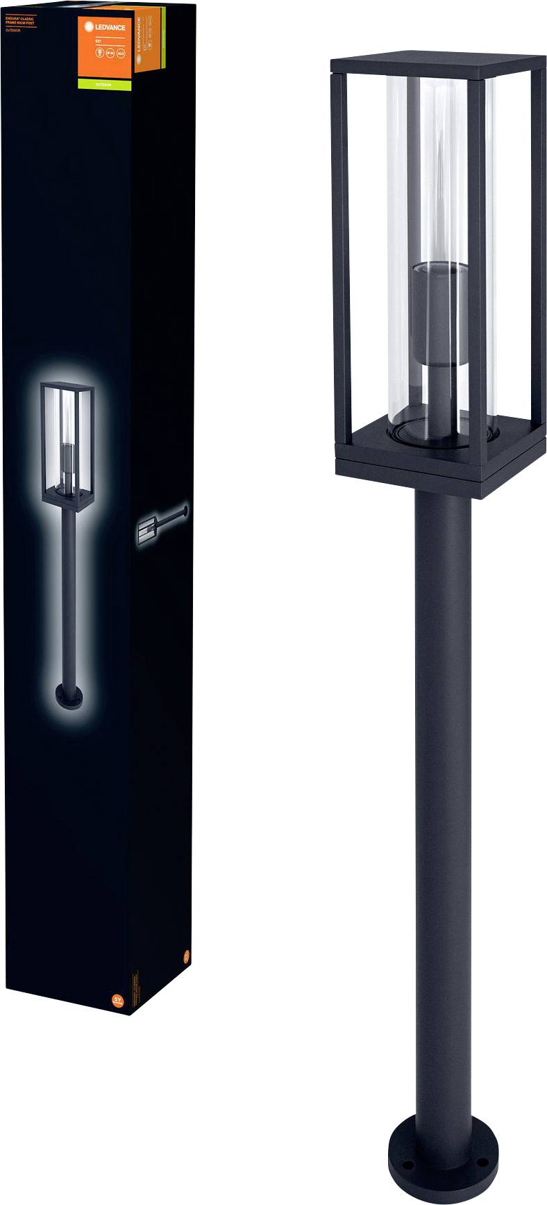 Floor lamp with a modern rectangular design in black, with a clear glass body. Packaging beside it shows product image and manufacturer's logo.