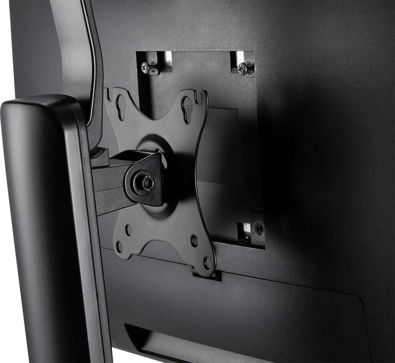 Back of a computer monitor with a VESA mount. The mount is black and features four screws for attachment.