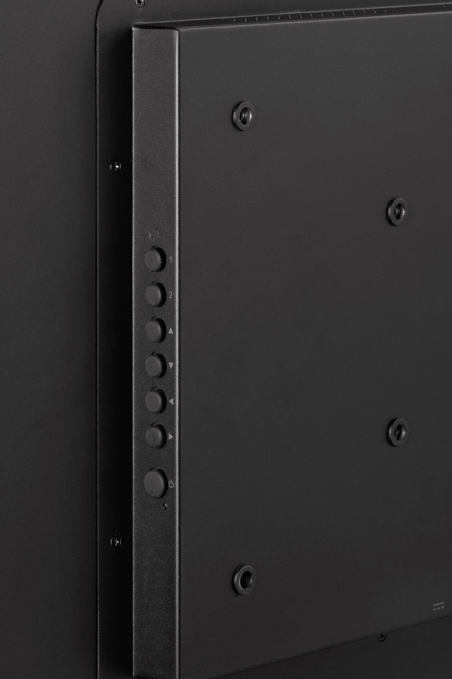 'Back of an electronic device with several circular buttons on the left side.'