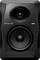 Black Pioneer DJ speaker with large woofer, small tweeter, and metallic surface. Suitable for music production or DJs.