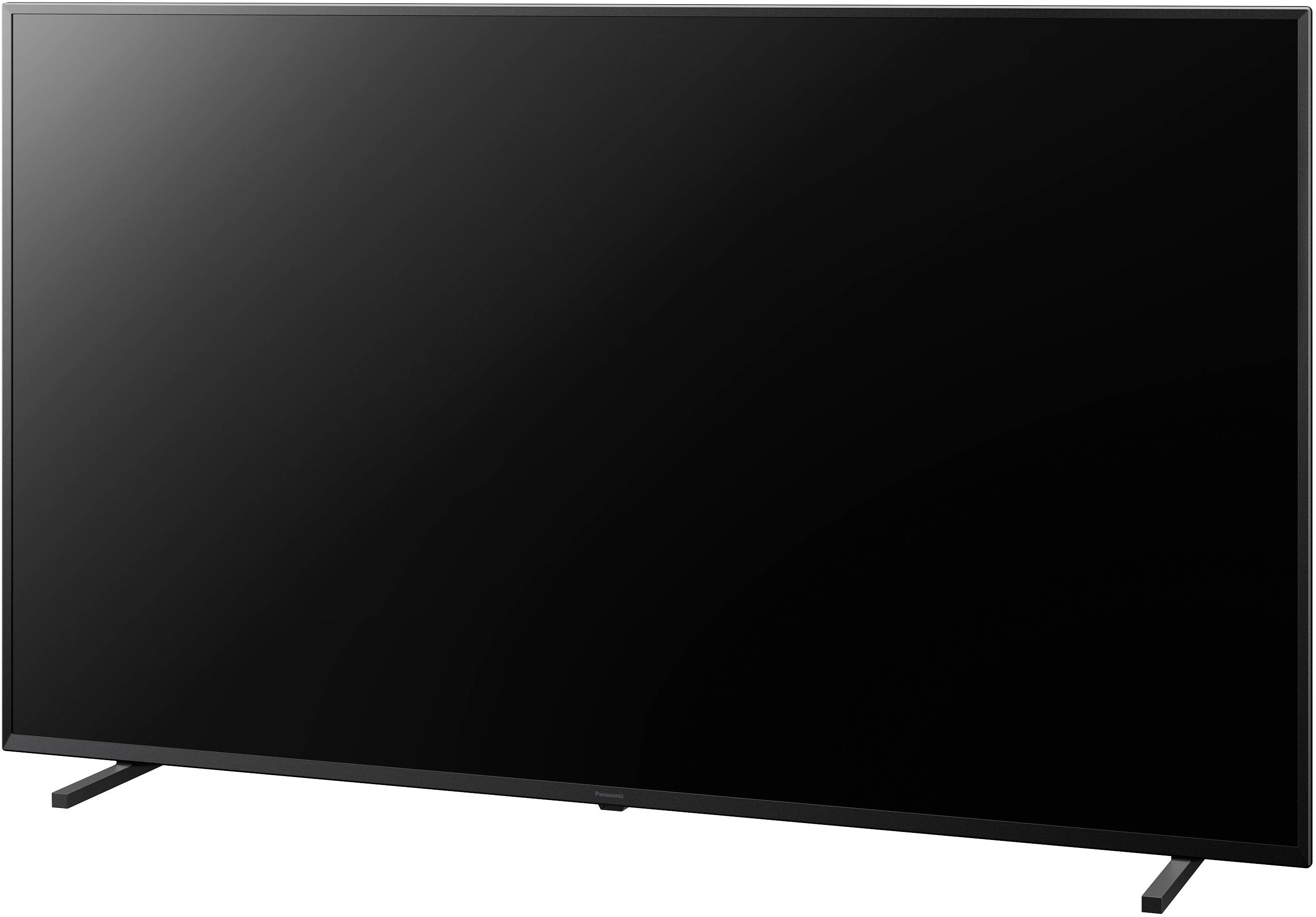 A modern flat-screen television with a black screen, standing on a table.