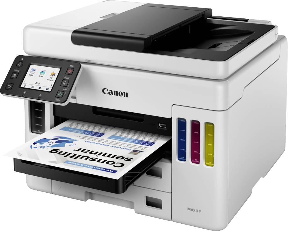 A white multifunction printer is printing a document with a colourful diagram. The display shows operating options.