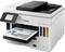 A white multifunction printer is printing a document with a colourful diagram. The display shows operating options.